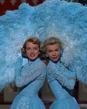 Jasmine Kennedie Instagram - Sisters….. sisters….. 👯‍♀️ 💎

•

Never were there such devoted sisters 🤭
Here is my unaired makeover look for @rupaulsdragrace 🫶🏻 This look was inspired by one of my favorite old Hollywood Musicals “White Christmas” starring Vera Ellen & Rosemary Clooney! My grandmother showed me this movie at a young age and I’ve loved it ever since. All the costuming, the music, the comedic timing, it’s all so perfect to me and I was super excited to bring one of my grandmothers favorite movies to the main stage! Super sad I didn’t get to showcase this look, but I’m SUPER glad you all get to see it now!! Who better to do a “Sister, Sister” look with then my drag sister @jasminekennedie 🩵 we hope you enjoyed this look, head on over to my YouTube to check out my new episode of Painted by Crystal where I transform Jasmine into ME!! 

•

Photography @theclavel 
Outfits @theladymarisa 
Hair @bitchcraft 
Location @balconsalonnyc 

•

Business Inquiries Only : 
Booking@prysm-talent.com 📩

• 

#dragrace #rupaul #crystalenvy #makeoverchallenge #whitechristmas #veraellen #rosemaryclooney #oldhollywood #vintage