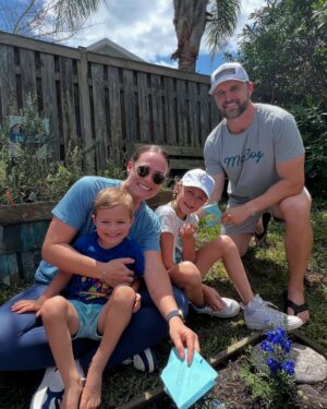 Kara Keough Instagram - Today, on McCoy’s 5th birthday, we say goodbye to our family home before we hand the keys over tomorrow. The walls of this home were a witness. They’ve seen love and laughter, pain and suffering, hurt and healing. They’ve seen birth, death, painful goodbyes, and new beginnings. These walls have held us during a pandemic, the loss of our son, the death of my dad. More of my tears have fallen inside this house than in all the other places my tears have ever fallen combined. The shower alone probably has a Tears Spilled Record individually, but our bedroom beats that out by at least half a million tons. Childhood has flared brilliantly within these walls, mainly ignited by my magnificently playful husband. McCoy’s spirit has raced equally playfully down these halls every day since he was born inside of it - opening doors, turning toys on, flashing lights, always finding ways to make us feel him. And while I’ve brought two other newborn babies home “to” it, only he was born into it, and therefore of it. This place is undeniably linked to him and saying goodbye to it rips something open inside me again. But hopefully what all those fit meatheads say is true when they explain: “It’s the microtears that make you stronger.” Beyond the walls, something even more treasured was built brick-by-brick: a community of friends that became family. God knew what was coming for us before He put us on “the Best Street in America,”  and these folks surrounded us in our time of grief, and loved us so damn well. I refuse to say goodbye to them, because these friendships we’ve made aren’t ones that are bound by proximity - no, these are those “no-matter-what” kinda friends. The night McCoy died, we walked to the end of the cul-de-sac to see the little garden the neighborhood kids planted for him while he was on life support in the NICU. As we walked, we noticed blue hearts hung on each door of our loving street. Every year, on his birthday, these no-matter-what friends throw him (and us) a party that makes each understandably hard milestone a day to look forward to. Each year, this day brings less pain and more joy. I think they call that healing, so thanks to my healers on the Court💙