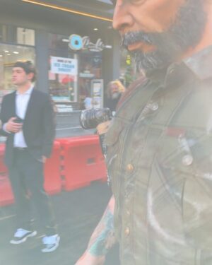 Landon Cider Instagram - At the @thelastofus S2 premiere yesterday in my #JoelMillerCosplay with a nod to the game’s Joel.
📸 @strange.victory in the portrait studio
Keep an eye out for a full BTS reel coming soon! 
Thanks @palantemax @humanbyorientation @sceneinblack for the invite and to my date looking beautiful as usual @gabicakes25. 
. 
#thelastofus #joelmiller #cosplay #dragking #dragqueen #makeup #cosplaymakeup