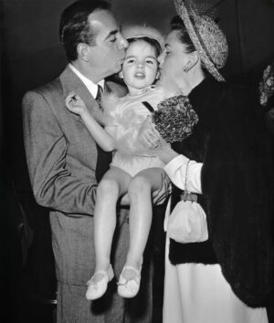 Liza Minnelli Instagram - Hi Kids! Happy Easter! Papa, Mama and me in Easter finery. I remember this pic! 
So grateful and so ready to hunt for eggs… soak up sunlight by my pool after a month of interviews, recording and producing the cast album of DRAG: The Musical, trading love on camera with majestic beauty RuPaul, who I love while being gifted a wonderful award. Shooting New York Magazine cover by @markseliger, collaborating with Tiffany and Co., genius and dear friend @christopheryoung as my collection of jewelry exhibitions are busy traveling… Beverly Hills, New York, Asia, Milan and well…just everywhere! Huddling with Emmy winning producer Sam Haskell, my once upon a time agent, more importantly beloved friend for decades and our tribe. All working on bringing my nearly finished book to the screen for Sam’s Magnolia Hill at Warner Brothers Discovery! Honey, I’m not retired! Just old! Today? Grabbing some chocolate, saying prayers and thanking you for showering me with love because I absolutely love each of you. 🐣 💋