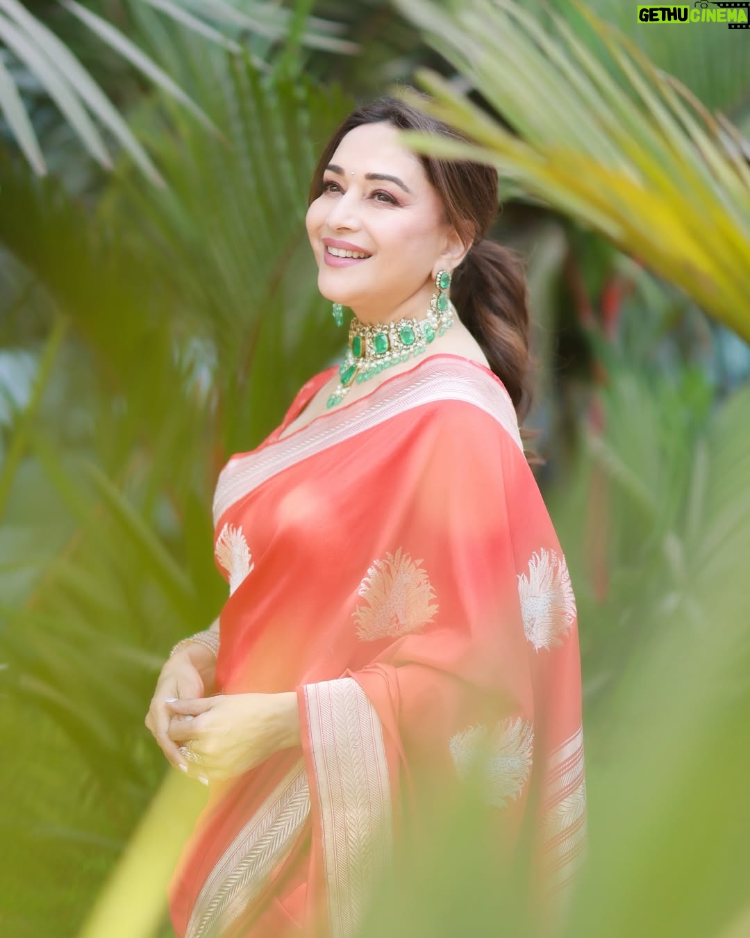 Madhuri Dixit - 488.4K Likes - Golden hour, golden glow, and a heart full of sunshine. ☀️
#tuesday #tuesdaythoughts #sareelove #sunshine #photoshoot #photooftheday