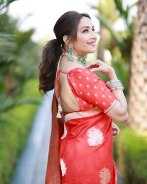 Madhuri Dixit Instagram - Golden hour, golden glow, and a heart full of sunshine. ☀️ 

#tuesday #tuesdaythoughts #sareelove #sunshine #photoshoot #photooftheday