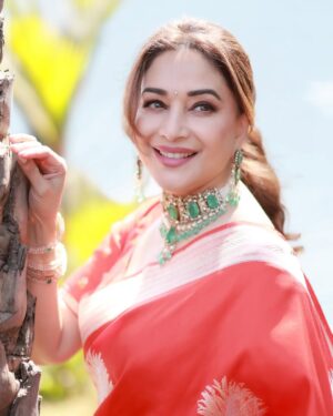 Madhuri Dixit Instagram - Golden hour, golden glow, and a heart full of sunshine. ☀️ 

#tuesday #tuesdaythoughts #sareelove #sunshine #photoshoot #photooftheday