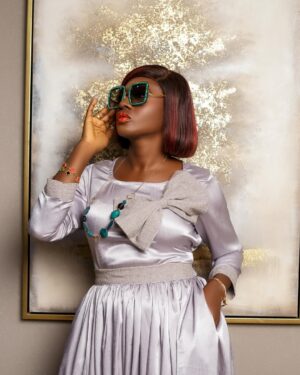 Martha Ankomah Instagram - WHEN ASKED IF MY CUP IS HALF-FULL OR HALF EMPTY, MY ONLY RESPONSE IS THAT I AM THANKFUL I HAVE A CUP.  HAPPY THURSDAY FAMILY. 
DRESS @styleinvogueafrique 
Skin care @vibrant_skin_care_ 
Delivered by @yabaghana 
Life style @wellnessbitegh