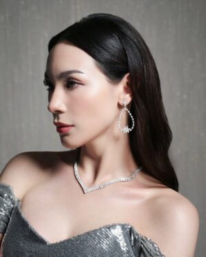 Melanie Berentz Instagram - Turning pages and turning heads ❄️

Radiate elegance this holiday season with a touch of luxury. These dazzling diamond earrings, delicately shaped into teardrop perfection, pair effortlessly with the sleek, V-shaped diamond necklace to create a look of timeless sophistication. The sparkling details catch the light with every move, perfect for festive gatherings and glamorous evenings. Shine brighter than ever and let your holiday vibe sparkle with grace and style.

Muse : @melanieberentz
Dress : @valenciavivi
Photographer : @snap.nuel
Makeup Artist : @kunsoomakeupartist

Discover more info about diamond, please contact our team : 
 62 816-888-655 (Hui)
 62 815-1799-9944 (Mike)

#DiamondElegance #TimelessJewelry #SparkleEveryday #LuxuryRings #ShineBright #PuteriIndonesia #MelanieBerentz #ChristmasGlam