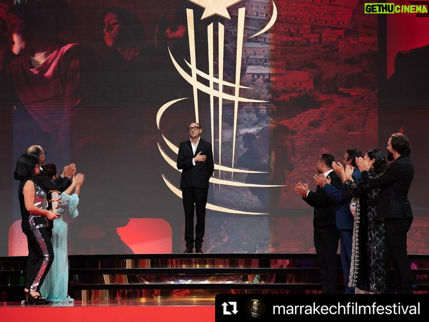 Nadia Kounda - 2.5K Likes - Une soirée auprès de mes chers partenaires de jeu pour rendre hommage au Realisateur Faouzi bensaidi, l’ami ♥️ et le cinéaste ♥️
#Repost @marrakechfilmfestival with @use.repost
・・・
TRIBUTE NIGHT 💫 : Faouzi Bensaïdi’s enchanting aura filled the room as cinema family honored him with a 25-year legacy Golden Star. Bensaïdi was welcomed on the stage of the #marrrakechfestival by Nezha Rahil, Nadia Kounda, Hajar Graigaa, Fehd Benchemsi, Rabii Benjhail, Mouhcine Malzi and Abdelhadi Talbi. #20thedition
ليلة التكريم 💫: ملأت نسمة فوزي بنسعيدي الساحرة الغرفة حيث كرمته عائلة السينما بالنجمة الذهبية على 25 عامًا من فنه. وكان في استقبال بنسعيدي على خشبة #مهرجان_مراكش نزهة راحيل ونادية كوندا وهاجر كريكع وفهد بنشمسي وربيع بن جهيل ومحسن ملزي وعبد الهادي الطالبي. #الدورة_العشرون