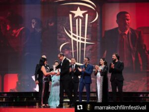 Nadia Kounda Instagram - Une soirée auprès de mes chers partenaires de jeu pour rendre hommage au Realisateur Faouzi bensaidi, l’ami ♥️ et le cinéaste ♥️ 

 #Repost @marrakechfilmfestival with @use.repost
・・・
TRIBUTE NIGHT 💫 : Faouzi Bensaïdi’s enchanting aura filled the room as cinema family honored him with a 25-year legacy Golden Star. Bensaïdi was welcomed on the stage of the #marrrakechfestival by Nezha Rahil, Nadia Kounda, Hajar Graigaa, Fehd Benchemsi, Rabii Benjhail, Mouhcine Malzi and Abdelhadi Talbi. #20thedition 

ليلة التكريم 💫: ملأت نسمة فوزي بنسعيدي الساحرة الغرفة حيث كرمته عائلة السينما بالنجمة الذهبية على 25 عامًا من فنه. وكان في استقبال بنسعيدي على خشبة #مهرجان_مراكش نزهة راحيل ونادية كوندا وهاجر كريكع وفهد بنشمسي وربيع بن جهيل ومحسن ملزي وعبد الهادي الطالبي. #الدورة_العشرون