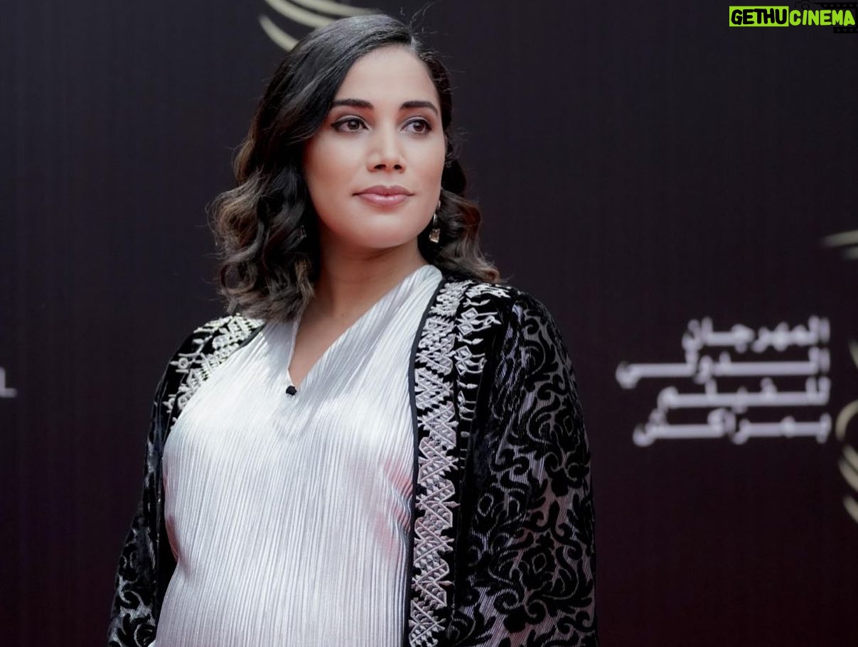 Nadia Kounda - 2.5K Likes - Une soirée auprès de mes chers partenaires de jeu pour rendre hommage au Realisateur Faouzi bensaidi, l’ami ♥️ et le cinéaste ♥️
#Repost @marrakechfilmfestival with @use.repost
・・・
TRIBUTE NIGHT 💫 : Faouzi Bensaïdi’s enchanting aura filled the room as cinema family honored him with a 25-year legacy Golden Star. Bensaïdi was welcomed on the stage of the #marrrakechfestival by Nezha Rahil, Nadia Kounda, Hajar Graigaa, Fehd Benchemsi, Rabii Benjhail, Mouhcine Malzi and Abdelhadi Talbi. #20thedition
ليلة التكريم 💫: ملأت نسمة فوزي بنسعيدي الساحرة الغرفة حيث كرمته عائلة السينما بالنجمة الذهبية على 25 عامًا من فنه. وكان في استقبال بنسعيدي على خشبة #مهرجان_مراكش نزهة راحيل ونادية كوندا وهاجر كريكع وفهد بنشمسي وربيع بن جهيل ومحسن ملزي وعبد الهادي الطالبي. #الدورة_العشرون