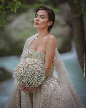 Nadine Rassi Instagram - I said yes for life 
I said yes for happiness 
I said yes for love 
I said yes for perfection 
And I said yes for troubles 
Am alive 💫
#NR 
Enjoy life girls we have one life ❤️💫

Image consultant & concept creator: @_zakissa 
Bridal bouquet: @zakbyzakhiaissa 
Hair by: @sameraboalhosen 
Makeup by: @lena.ibrahim.mua 
Dress by: @designed_couture 
Photographer: @rawadmakhoulphotography 
Nails : @by_christinahamdan