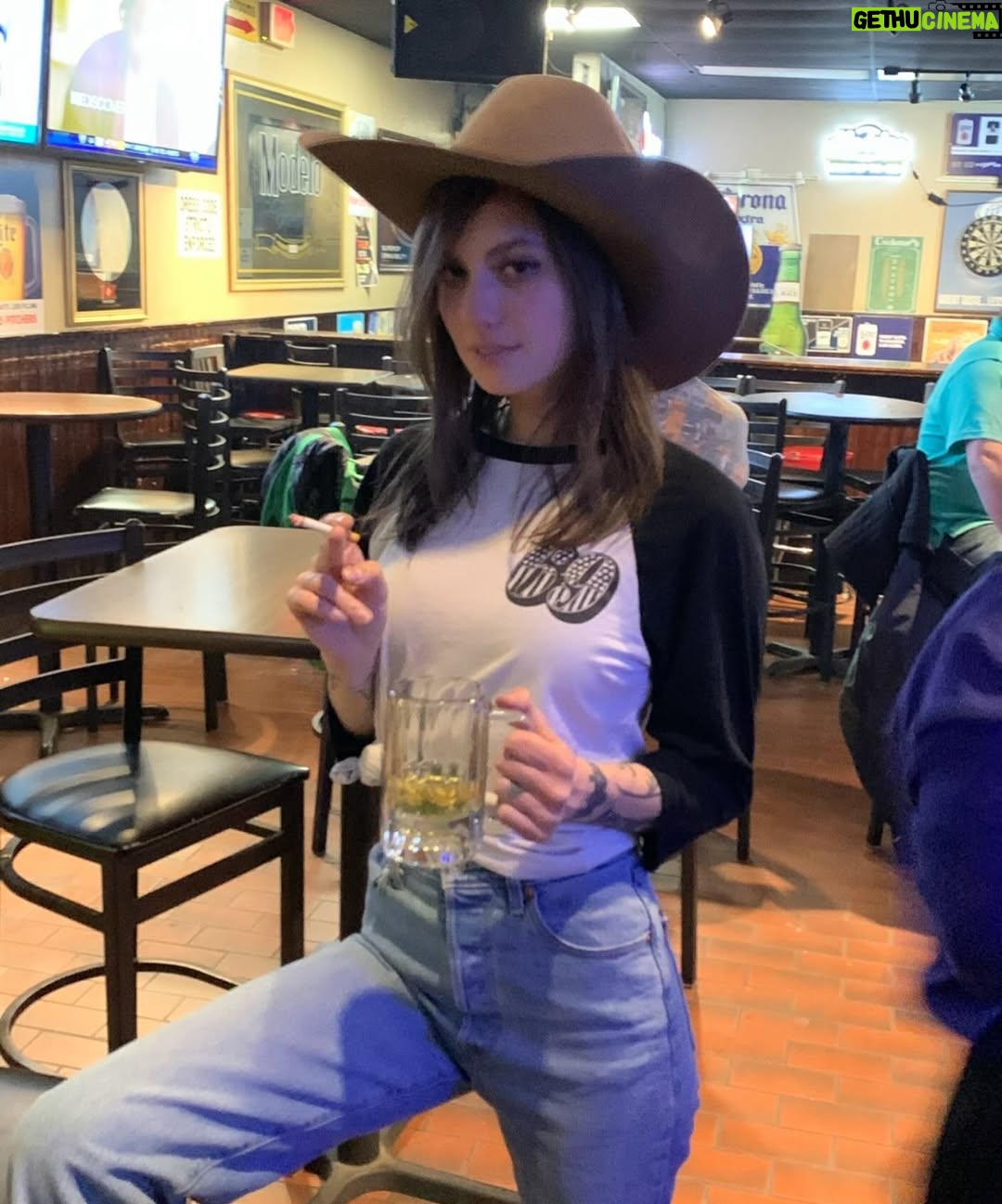 Natalie Cuomo - 17.4K Likes - This photo is from the first time I headlined in Texas. It was January 2022 and I did karaoke at a bar where you could smoke inside and we were snowed in for the weekend! This is where I learned the significance of asking a man to wear his cowboy hat 🤠 you can’t just use it for a photo and then run away without them getting mad! Anyway, I’ll be back in Texas April 18&19 in Fort Worth at @biglaughcomedy