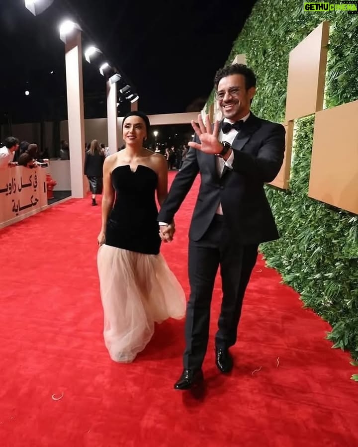 Ola Roshdy - 43.2K Likes - Thank you for a delightful night from the opening ceremony of @redseafilm 💫⭐️✨
My Look curated by @angie_neklawy
Dress @darjeestudio
Jewerly @vintagelanejewelry
Make Up @riimaa.makeupartist
Hairdresser @malaksamy_1 @alsagheersalons
Ahmed’s look by @nada_hussam
Suit @boss
Thank you @hamedz199 for the awesome pix ✨✨