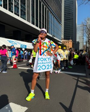 Phoebe Robinson Instagram - YES, BITCH! My third marathon in eleven months! YES, BITCH, my first time running one without an injury or an illness. YES, BITCH, I shaved SEVENTEEN MINUTES off my best marathon time, which was last year’s Boston Marathon! Whoo! A PR (personal record) for PR (that’s me, Phoebe Robinson, lol). But NO BITCH, I didn’t have a “Lost in Translation” meet cute/whirlwind soulmance aka soul romance w/an old ass piece of gabagool around Tokyo. #WomenCantHaveItAll 

For real tho, running the @tokyomarathonfoundation was a dream that started a year ago when @mrshanlui & I texted each other to say we should go for it and try and get into the marathon. Somehow we both did (me as a charity runner & her via the lottery). And then we were like HOLY SHIT! WE’RE GOING TO TOKYO!

1) Post race right after I got my medal. My feet hurt. I was dead tired. And I was nauseous. But none of that mattered cuz babygirl was proud of herself.
2) At the start line with Shan & @jeffreymce 
3) Running thru the start line was magical.
4) One thing the Tokyo Marathon was gonna do was give ya the ole razzle dazzle. There were performers thruout the race, which truly made it a celebration.
5) Lol. This Mario runner and I kept seeing each other during the race. He was so funny and sweet. 
6) Lmaooooo. Very excited to see black people!
7) Another moment of glory. Thank you, Japan Cancer Society, for letting me run for you! ❤️❤️❤️
8) Met these queens post race as I was waiting for my Uber and questioning my life choices. Haha. It was much hotter than expected, so we all were pushed to our limits. And this was the first race where I was someone else’s marker. So honored. Truly means a lot!
9) Okay, isn’t post marathon poncho the cutest? I will be wearing this around my house and to future Pap smears. 🤣🤣🤷🏾‍♀️🤷🏾‍♀️
10) The staff at my hotel were so cute when I asked them to take a pic of and they were like…let’s do it on the balcony, so Tokyo Tower. What in the America’s Next Top Model creative direction was that?! Lol. They understood the assignment & wanted me to get my shot for look book when I do my go sees. 🤣🤣
11) Finish time. One day, I will run a 4:30:00 marathon. #TokyoMarathon