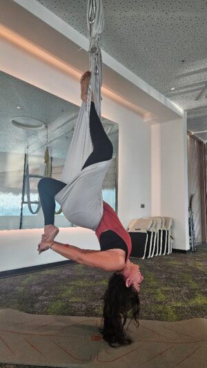 Pooja Bedi Instagram - Head over heels in love with life and  aerial yoga. 
I didn't know my body could still do this sort of stuff. ❤️❤️❤️

What an amazing session at @swastikwellbeing .

I started shaky and ended triumphant!!
Triumph of mind over matter .. and driven by the spirit of curiousity and adventure. 

And of course knowing I'm in good professional  hands. 

Challenge yourself to do something that goes beyond your boundaries.

Why? 

Why not !!!!! 

#aerialyoga #challenge #wellbeing 
@happysoullifestyle