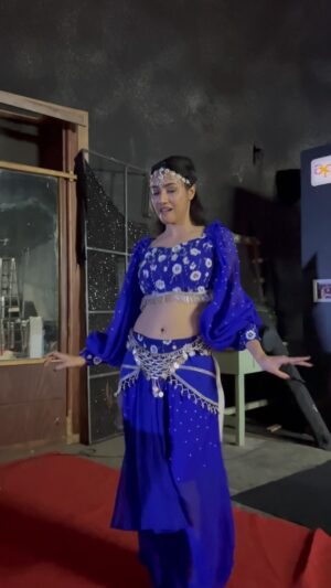 Ramola Instagram - "Lost in the rhythm, every move flows seamlessly with the background music, as if the beat is writing the story and the dance is the language of the soul." 

Vc: @rakshak_bullet  thank you 😊

#actressramola #bharjaribachelorsseason2 #zeekannadaserials #dbosssongs #zeekannadaactress #televisionshow #kannadareels❤️ #tabalatabala #bellydanceshow #bellydanceworld #angleoutfit #bellydanceoutfit #blueangles #bellyornament