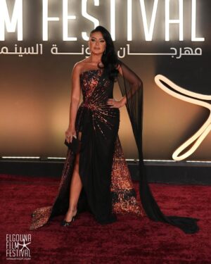 Rania Youssef Instagram - Stepping into the magic of El Gouna Film Festival 🖤✨

@elgounafilmfestivalofficial 
Dress & Styled by @dolly.k_designs 
Jewelry @bijoux.jewelry.eg 
Makeup @marcellinoosamaa for @alsagheersalons 
Hair @magedelmasry61 for @haithamdahab00