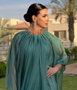 Riham Abdel Ghafour Instagram - "I believe in being strong when everything seems to be going wrong. I believe that happy girls are the prettiest girls. I believe that tomorrow is another day, and I believe in miracles." AUDREY HEPBURN.  Styled by @abier_ansary  Make up @abdallahelrefaeii  Hair @mahmoud_hair_stylist  Full look @dinouche.designs