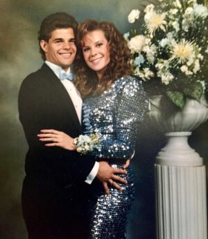 Robyn Lively Instagram - Yesss look at this prom queen y’all! I wasn’t really prom queen but I felt like one. My mom made this beautiful sequined gown and I loved it so much. 🩵 Here with my high school bf Craig. He was a football player at Granada Hills High. I always wanted to date a football player named Craig ;) and to be a cheerleader. The closest I ever got to being a cheerleader was in Teen Witch. I LOVED my cute purple outfit and pleated white skirt in that scene. Sigh… This was a much simpler time. Music, big hair, and shoulder pads ruled!! Also kinda still loving those nails tbh. Happy #tbt #80s #prom