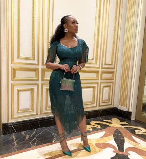 Sandra Ankobiah Instagram - Wearing green, ready to be seen! 

👗 @thefashionsteer 
Hair @ohmyhair
Braids by @braid_and_beyond