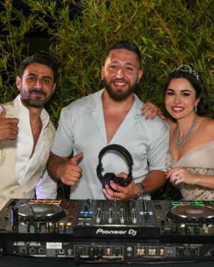 Sara Abi Kanaan Instagram - Swipe to Meet the wedding team 😍🤍 - “The Thousands Candle Wedding” 🕯️ 
•
@eyecandy_events @linasarkisian @avosofian Lina, where to begin … we met in September and that’s when we instantly fell in love with you ! Any couple would be lucky to have you as their wedding planner, you manage to turn everything you see into magic we love you dearly 🧚‍♂️🔮
@azizahere we met 7 years ago and had a blast on stage little did I know that this friendship would lead you to sing in our wedding 🥹 love you neighbor 😉❤️
@lens.tales GUYS!!! They say a picture is worth a thousand words? Yours is worth a thousand fairytales thank you for holding our hand through this 📸 
@saveursdumondecatering @eternityhamatvillage @nkossaify always the positive passionate man !! You were on fire !!! Your venue was heavenly and the people couldn’t stop talking about your food and your service ! No one can ever top what you did 🪄 
@sayitwithchocolate_lb you witnessed it all since the beginning , the women empowerment message behind your business is why we met and became friends!!! Your smile and presence and CHOCOLATE were everything!!! Also people took all the boxes they could see and are still eating to this day !! 🤣 🍫 
@dj.eyli all I could hear on the dance floor was “the dj is awesomeee” no one could stop dancing and what’s more impressive is that you didn’t even use a screen 😉
@casadelflora robert, the candles, the flowers, the wall of fame … everything you customized and created from scratch was out of this world, you’re a true artist 🌸 
@selectagency jemmy and the girls thank you for your professionalism, you were able to accommodate the last minute changes and obstacles with flying colors and we didn’t even notice 👩‍💼 
@rarevents.lb no one wanted to leave the welcome drink area because of you 🤣 the entertaining booths idea was the best thing ever 🎊
@skylightlebanon thank you for the fantastic job you did 🥹 🎤 
@etsrabihm we’re happy to be the first ones to have used your new furniture! The industrial chic theme was on point 🖤
