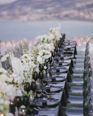 Sara Abi Kanaan Instagram - Swipe to Meet the wedding team 😍🤍 - “The Thousands Candle Wedding” 🕯️ 
•
@eyecandy_events @linasarkisian @avosofian Lina, where to begin … we met in September and that’s when we instantly fell in love with you ! Any couple would be lucky to have you as their wedding planner, you manage to turn everything you see into magic we love you dearly 🧚‍♂️🔮
@azizahere we met 7 years ago and had a blast on stage little did I know that this friendship would lead you to sing in our wedding 🥹 love you neighbor 😉❤️
@lens.tales GUYS!!! They say a picture is worth a thousand words? Yours is worth a thousand fairytales thank you for holding our hand through this 📸 
@saveursdumondecatering @eternityhamatvillage @nkossaify always the positive passionate man !! You were on fire !!! Your venue was heavenly and the people couldn’t stop talking about your food and your service ! No one can ever top what you did 🪄 
@sayitwithchocolate_lb you witnessed it all since the beginning , the women empowerment message behind your business is why we met and became friends!!! Your smile and presence and CHOCOLATE were everything!!! Also people took all the boxes they could see and are still eating to this day !! 🤣 🍫 
@dj.eyli all I could hear on the dance floor was “the dj is awesomeee” no one could stop dancing and what’s more impressive is that you didn’t even use a screen 😉
@casadelflora robert, the candles, the flowers, the wall of fame … everything you customized and created from scratch was out of this world, you’re a true artist 🌸 
@selectagency jemmy and the girls thank you for your professionalism, you were able to accommodate the last minute changes and obstacles with flying colors and we didn’t even notice 👩‍💼 
@rarevents.lb no one wanted to leave the welcome drink area because of you 🤣 the entertaining booths idea was the best thing ever 🎊
@skylightlebanon thank you for the fantastic job you did 🥹 🎤 
@etsrabihm we’re happy to be the first ones to have used your new furniture! The industrial chic theme was on point 🖤