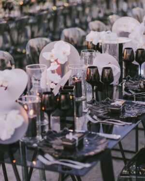 Sara Abi Kanaan Instagram - Swipe to Meet the wedding team 😍🤍 - “The Thousands Candle Wedding” 🕯️ 
•
@eyecandy_events @linasarkisian @avosofian Lina, where to begin … we met in September and that’s when we instantly fell in love with you ! Any couple would be lucky to have you as their wedding planner, you manage to turn everything you see into magic we love you dearly 🧚‍♂️🔮
@azizahere we met 7 years ago and had a blast on stage little did I know that this friendship would lead you to sing in our wedding 🥹 love you neighbor 😉❤️
@lens.tales GUYS!!! They say a picture is worth a thousand words? Yours is worth a thousand fairytales thank you for holding our hand through this 📸 
@saveursdumondecatering @eternityhamatvillage @nkossaify always the positive passionate man !! You were on fire !!! Your venue was heavenly and the people couldn’t stop talking about your food and your service ! No one can ever top what you did 🪄 
@sayitwithchocolate_lb you witnessed it all since the beginning , the women empowerment message behind your business is why we met and became friends!!! Your smile and presence and CHOCOLATE were everything!!! Also people took all the boxes they could see and are still eating to this day !! 🤣 🍫 
@dj.eyli all I could hear on the dance floor was “the dj is awesomeee” no one could stop dancing and what’s more impressive is that you didn’t even use a screen 😉
@casadelflora robert, the candles, the flowers, the wall of fame … everything you customized and created from scratch was out of this world, you’re a true artist 🌸 
@selectagency jemmy and the girls thank you for your professionalism, you were able to accommodate the last minute changes and obstacles with flying colors and we didn’t even notice 👩‍💼 
@rarevents.lb no one wanted to leave the welcome drink area because of you 🤣 the entertaining booths idea was the best thing ever 🎊
@skylightlebanon thank you for the fantastic job you did 🥹 🎤 
@etsrabihm we’re happy to be the first ones to have used your new furniture! The industrial chic theme was on point 🖤