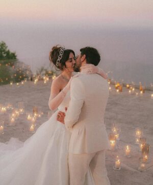 Sara Abi Kanaan Instagram - “I will love you till the end of time”. 
From the magical wedding day of Sara and Wissam ✨

Bride’s look:
Dress: @antoinekarehcouture
Jewelry: @nsoulijewelry
Hair: @simonelmendelek
Bouquets & headpieces: @bbloomed.lb
Stylist @sarah.keyrouz
Makeup: @makeupbyomz
Lashes: @linesbybaniahaidar
Heels: @giva_bygiovannie
 
Groom’s look:
Suit: @maison.eliomoussallem

Wedding planner: @eyecandy_events @linasarkisian @avosofian
Catering: @saveursdumondecatering
Flowers: @casadelflora
Photography: @lens.tales
Cadeau de retour: @sayitwithchocolate_lb
Furniture: @etsrabihm
Interactive wedding stations: @rarevents.lb
Hostesses: @selectagency
Venue: @eternityhamatvillage
PR&Media: @yasminesharawneh
DJ: @dj.eyli
Lighting & Sound: @skylightlebanon