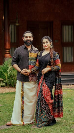 Sruthi Lakshmi Instagram - A Tapestry of Togetherness 
When love meets legacy and fashion tells a story you get moments like these.

Worn by the graceful @lakshmi.sruthi and the charming @avin_anto this look is more than just style it’s a celebration of heritage, individuality, and connection.
He wears a tale of tradition in our Black Kantha Full Sleeve Multi Patch Shirt, styled effortlessly with a kasavu touch. She glows in our Black Mulcotton Scallop Saree with Multi Patch Pleats a blend of timeless elegance and handcrafted beauty.

Together, they embody the spirit of Byhand where every outfit is not just made, but felt.

Videography - @_raylightsphotography_
MUA - @shimmerwith_sara_mua

#ByhandInStyle #SruthiLekshmi #AvinAnto #HandcraftedWithLove #CoupleGoals #EthnicElegance #PatchworkPerfection #SlowFashionIndia #MadeWithSoul #RootedInCulture #ByhandStories