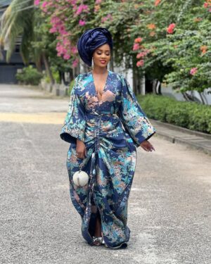 Toni Tones Instagram - Queening! ✨ 

Celebrated my dad’s birthday in style! 💙🎉

And one thing about me? My gele is ALWAYS going to gele, hunnay! 💁🏽‍♀️✨”

Obsessed with my fabulous Asoebi 😍 — this Japanese-inspired kimono dress made by the incredible @adeysoile 😍❤️🔥