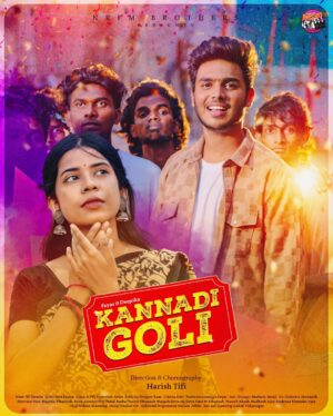 deedoll Instagram - “The wait is over! Presenting the official poster look of Kannadi Goli  A glimpse of the energy coming your way! Stay tuned and let the hype begin!”

Nrfm presents 
Starring : Fayas & Deepika 
Production -Nrfm Productions 
Director & choreography - Harish Tifi
Music -yc Dewin
Cinematography- Subash 
Lyrics -poet deena 
Editor - Arun 
VFX Supervisor - Arun
Publicity Designer - Ram 
Colorist -Giri
Production Manager - Fayas
Assistant Manager - Mufaris , Balaji 
Co - Ordinator - Jaswanth
Direction Team - Magesh , Dhanush , Deva 
Asst choreography - Magesh 
Associate Dop - Tufail Basha
Making Video - Raj 
Food Department - Anbu catering 
Focus Puller - Krishna kumar 
Camera assistants - Arun, Vinoth Kumar
Lights - Umapathy, Vadivelu, Mani
Track and Dolly - Mayan and Team
Location Support - jaswanth , Dinesh , Vicky , yuvaraj , vimal 

Dancers Boys - Dhanush,Magash ,Deva, raj,Deva, Hari,M.Dhanush ,Naresh,Akash,Madhesh,Ajay Androue , Elumalai, Ajay

Song credits:

Song Name - Kannadi Goli

Music composed and programmed by - Yc Dewin 
Lyrics by - Poet Deena 
Sung by- Nelson Manning 
Guitar by - Venkat Gv
Additional Programmed by -Nelson , Nikki 
Percussions live by- Senthil, Mani
Dolak By-Senthil, Mani 
Udukku by- Mani 
Mix and Mastering by - Gokul Vidyasagar the plural 
Recorded @Reegara Studios
Percussions Recorded @daw records
Percussions Record by-Vasanth

Special thanks to : honorable inspector of police G5 limit & respect G5 limit writer MARI SELVAM sir
Special thanks to : honorable inspector of police G5 limit & respect G5 limit writer MARI SELVAM sir