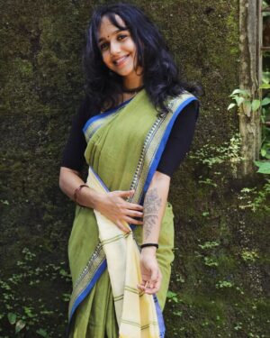 Anagha Ravi Instagram - simple onam in this beautiful saree from @yarn.culture 💚