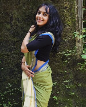 Anagha Ravi Instagram - simple onam in this beautiful saree from @yarn.culture 💚
