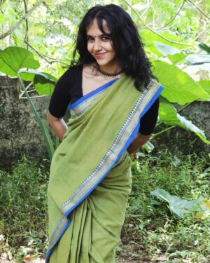Anagha Ravi Instagram - simple onam in this beautiful saree from @yarn.culture 💚