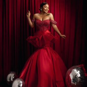 Bimbo Ademoye Instagram - Merry Christmas from me to you.  I love you so much. 
Before you go and eat rice and chop chicken , quickly rush to YouTube to watch The homecoming on BIMBOADEMOYETV. 

Photography @edos_artistry 
Styling @by_mickeycreates 
Dress @houseof_kechy