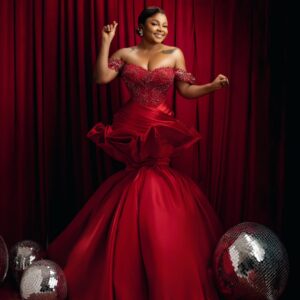 Bimbo Ademoye Instagram - Merry Christmas from me to you.  I love you so much. 
Before you go and eat rice and chop chicken , quickly rush to YouTube to watch The homecoming on BIMBOADEMOYETV. 

Photography @edos_artistry 
Styling @by_mickeycreates 
Dress @houseof_kechy