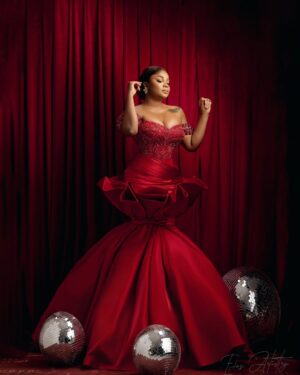 Bimbo Ademoye Instagram - Merry Christmas from me to you.  I love you so much. 
Before you go and eat rice and chop chicken , quickly rush to YouTube to watch The homecoming on BIMBOADEMOYETV. 

Photography @edos_artistry 
Styling @by_mickeycreates 
Dress @houseof_kechy