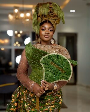 Eniola Badmus Instagram - Senator Badoskyyy……Friend of iyayawo did not come to playyyyyy #JP2025
 
Outfit by @lolarsfinesse 

New premium wig by @cassie_hair 

Make up by @pojan_studio 

Aso ebi fabric by @shantiz_asoebi_n_event 

Gele and hand fan by my boo @temmaautogeleconcept 

Video shot by my G with zero Gbenzume @_juicyjeff1_ 

Photography by @portraitsby_id 

Hand bag @dolcegabbana 

Shoes by @maisonalaia 

#eniolabadmus
