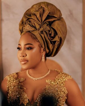 Erica Nlewedim Instagram - Out for @its.priscy 🩷🩷
Dress @artalia_atelier 
Styling @momentsbysbr  @style_by_ruvero 
Makeup @kim_beautystudio 
Gele artiste @oni_gele 
Photographer @tosinjoshweddings