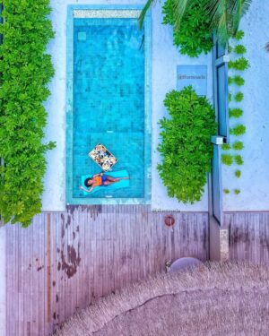 Ifu Ennada Instagram - Floating Breakfast in my Beach Villa! Can you spot me in all the pictures?!🤣 What slide is your Fave? I wanted to show you guys all the Angles, so yeah, I went "Drone" 🤣
___
#Maldives is so beautIFU and so much fun!
___
Skin: my @beautifuskin Products 
__
Art Director @mood_by_asher