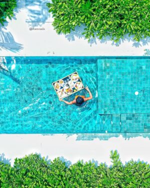 Ifu Ennada Instagram - Floating Breakfast in my Beach Villa! Can you spot me in all the pictures?!🤣 What slide is your Fave? I wanted to show you guys all the Angles, so yeah, I went "Drone" 🤣
___
#Maldives is so beautIFU and so much fun!
___
Skin: my @beautifuskin Products 
__
Art Director @mood_by_asher