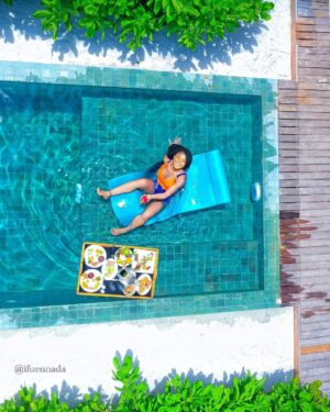 Ifu Ennada Instagram - Floating Breakfast in my Beach Villa! Can you spot me in all the pictures?!🤣 What slide is your Fave? I wanted to show you guys all the Angles, so yeah, I went "Drone" 🤣
___
#Maldives is so beautIFU and so much fun!
___
Skin: my @beautifuskin Products 
__
Art Director @mood_by_asher