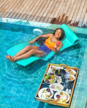 Ifu Ennada Instagram - Floating Breakfast in my Beach Villa! Can you spot me in all the pictures?!🤣 What slide is your Fave? I wanted to show you guys all the Angles, so yeah, I went "Drone" 🤣
___
#Maldives is so beautIFU and so much fun!
___
Skin: my @beautifuskin Products 
__
Art Director @mood_by_asher