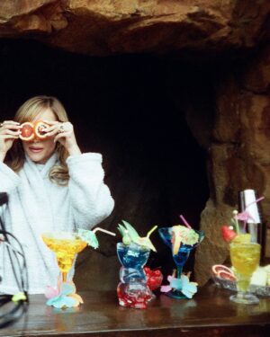 Imogen Waterhouse Instagram - Suki Waterhouse, sporting a fantastic pair of fake breasts, signature blonde hair swept up in a Pamela Anderson do, jogs after an old man speeding around on a sparkling red motorized scooter. In the music video for the new single “On This Love”, Suki indulges in the humor and opulence of a love that might be a little bad for you.

It’s the type of music video that’s a joy to watch, maybe because you can tell the people who created it were having a great time: the video was directed by Suki’s younger sister Immy Waterhouse. The sisters share sunny good looks, sly charm, and a mischievous sense of humor that delights in the dark details. They’re quick to laugh, not shy about telling each other off, and just as protective as they may be each other’s toughest critics.

At the link in bio, Suki and Immy chat about losing yourself in love, directing each other, and the joy behind their art and sisterhood.

Photography by Kathryn Hoy and Muriel Margaret