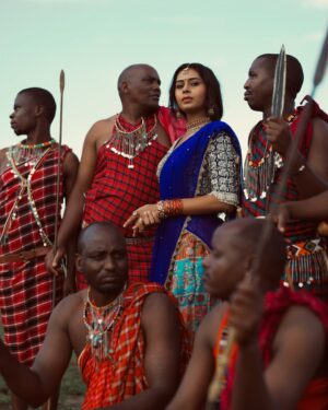 Ishita Varsha Instagram - When cultures collide! ❤️ 

@thespatika @chandangowda_official 

#ishitavarsha #thankyougenie🧞‍♀️ #blessedlife❤️ #loveandgratitude❤️ #conceptshoot #africa #india #traditional #tradition #masaimara #masai #masaimaranationalpark #culture #halfsaree #african #africans #indian #photoshoot #cultures #outfit #outfits #jewellery #southindian #southindianactress #kannada #kannadigas #kannadiga💛❤