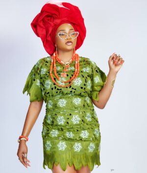Jumoke Odetola Instagram - Meet Olori Kofoworola in Seven doors showing exclusively on NETFLIX 

YES!!!!!!!!!!!!!!!!!!!!! I am wearing my mummy’s priceless vintage lace❤️❤️❤️❤️❤️❤️❤️❤️❤️❤️❤️❤️❤️

 AFRICAN QUEEN : Olori Kofoworola in 7 doors series by the amazing filmmaker @femiadebayosalami 

Theme says: Vintage glam, so I glammed mama’s lace up. 
I got this classic vintage lace from my maama’s wardrobe & I picked the Christmas color🥰😀

Vintage is CLASSIC! RAW GOLD🥰

@lolarsfinesse beautifully designed this to perfection 

Mua @officialherbeysignature

Gele @gele_by_irawo

Beads @njuheightbeads

Photographer @dmtej_photography

#SevenDoors
#SevenDoorsOnNetflix 
#sevendoorspremiere