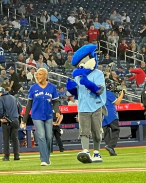 Karen Robinson Instagram - Y’all - what even is my life??? Number eleventy seven thousand on Things I Didn’t Even Know I Had On My 🪣Bucket🪣 List!!!

Thank you ⚾️ @bluejays  for having li’l ol’ can’t-throw-can’t-catch me as your Ceremonial First Pitcher. No one important was maimed, and I did not humiliate myself, and adorbs @mason.fluharty took my acting notes and pitched like a champ, and WE WON!!!!🎉🎉🎉 (Y’all welcome😁)

Best of all - I got to hang with my @lawandorderto peeps - @kccollinsworld (and kid), @stephenacshinn (from @larkproductions ), and @alessiastaff and #kalestockwell (🙏🏽for taking such good care of us, @rogers ). *** @j_mcintyre5 missed my first pitch because 🍤🍱🍔, and I told him I was gonna tell EVERYBADDY!!!***

Finally, I showed up “jersey cute” because
💋 @lady_kerry
🧑🏼‍🦱@lorrij_texturedbeauty

🙏🏽🙏🏽🙏🏽⚾️🧢🇨🇦❤️🙏🏽🙏🏽🙏🏽