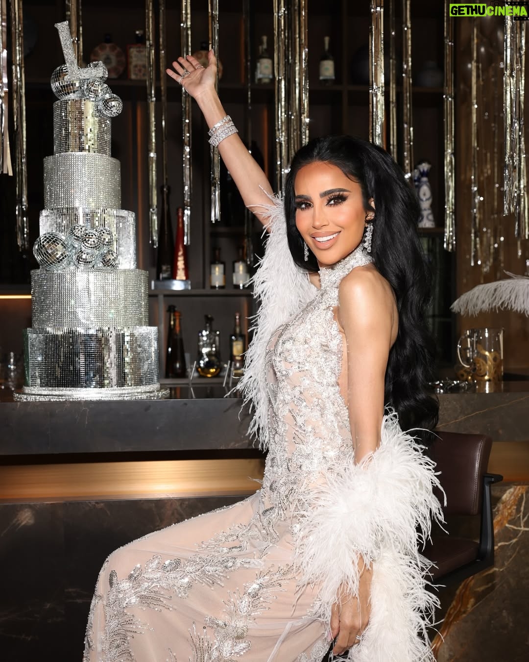 Lilly Ghalichi - 0 Likes - A glimpse inside the details of my 42nd Disco 🪩 thank you to everyone that made it so special, I’m still on cloud 9 but I promise I’m almost done posting lol ❤️
Event: @detailsbyhaleh
Dress: @waltercollection
Flowers: @dushanflowers
Cake: @maisondelafork
Custom Signs: @glamsignia
Photos: @victoriasirakovaphotographer