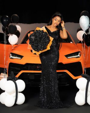 Mercy Eke Instagram - I’m stubbornly blessed and victorious, it’s not a debate 🧡🧡 #LamboInALambo 

Decor @itsthepicnic 🖤
📸 @bangraphy

Lamborghini sourced by @jbautos_machines 🔥