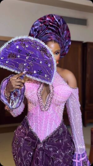 Mercy Eke Instagram - ACHALUGO 💜💜💜💜💜

Dress - @pearls_bridals 
Styling - @officialswazzi
Makeup - @revysbeauty 
Fan & Beads - @onyix_craft
Gele - @sammyinventions
Hair stylist @oghairplace 
Maidens - @afrikconcept 
Video @_avidstudio