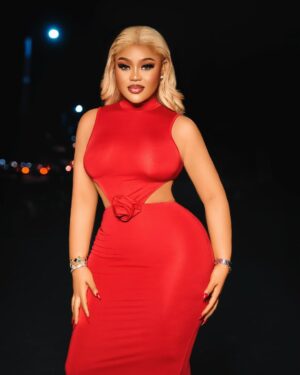 Nwaoha Chioma Blessing Instagram - Just a Baby Girl and Her Red Dress 🥰❤️…….. 

Shop Active wears @getslimby_spanky 🥳🥳🥳🥳