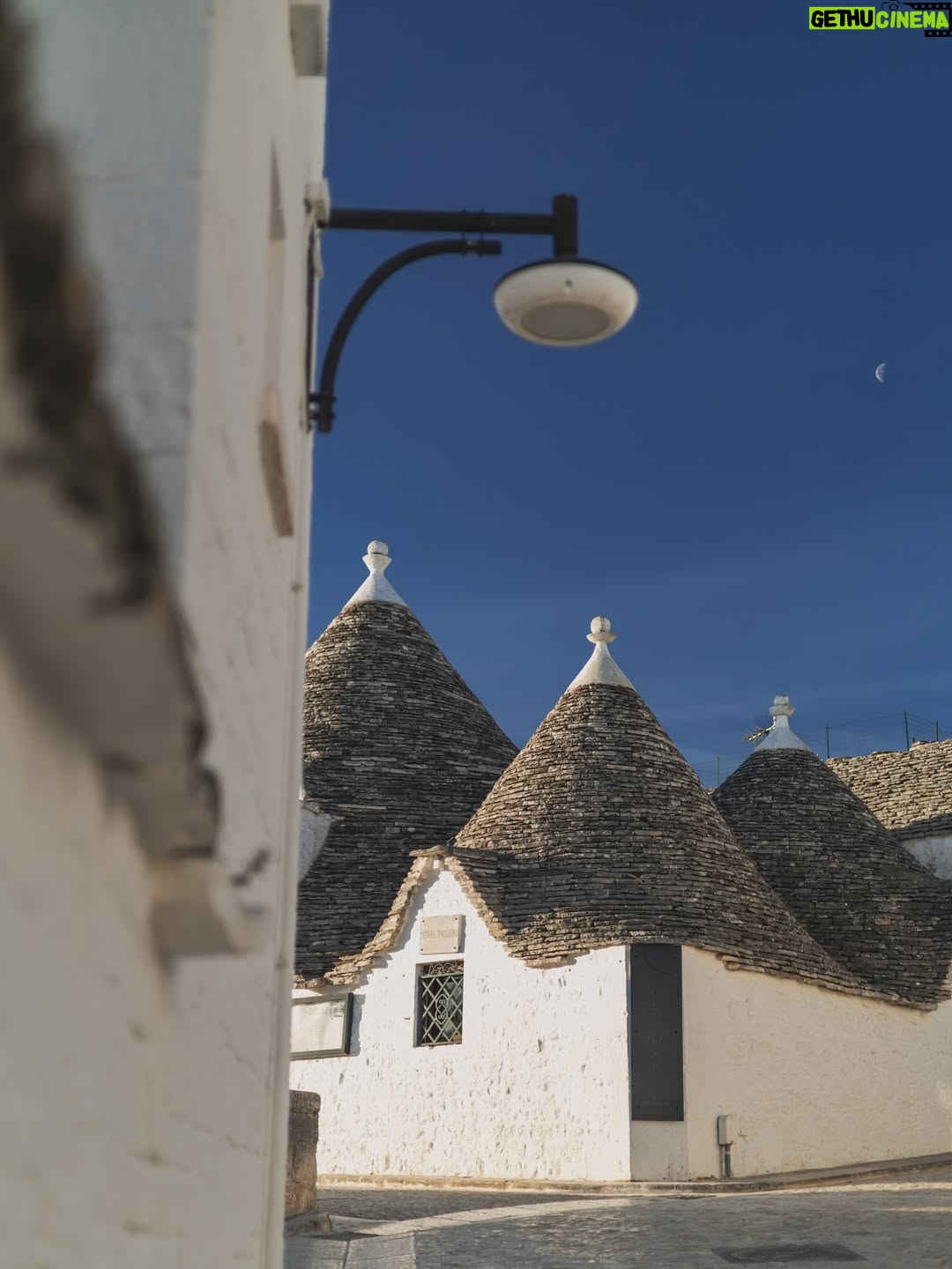 Rebecca Roy - 113K Likes - 📍Alberobello in one magical morning!
This UNESCO World Heritage town in Puglia is famous for its Trulli — cone-roofed houses built entirely without mortar. These stone homes date back to the 14th century and were once designed to be easily dismantled to avoid taxes!
In just a few hours, we:
• Wandered through quiet Trulli lanes under the morning moon
• Learned about their fascinating architecture and history
• Explored charming local shops inside the Trulli
• Tried local wines, fig jams & olive oil
• Soaked in that golden morning light that made the whole town glow
Tip: We stayed in an actual Trulli at @tipicoresortalbergo — and highly recommend spending a night (or two!) here instead of doing a day trip.
Waking up early and catching the peaceful streets before the crowds arrive? 100% worth it.
Travel by @gtholidays.in
All content is self shot
#Alberobello #TrulliExperience #PugliaTravel #UNESCOWorldHeritage #coupletravel #ItalyHiddenGems #TipicoResort #TrulliStay #SlowTravelEurope #AlberobelloTips #chennaiinfluencer